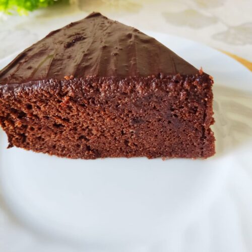 A slice of moist chocolate cake
